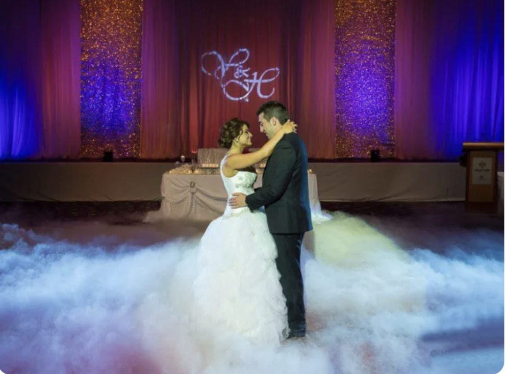 Couple on a dance floor with low fog effect
